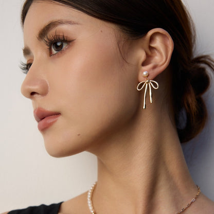 リボンデザイン ピアス(ゴールド・シルバー)