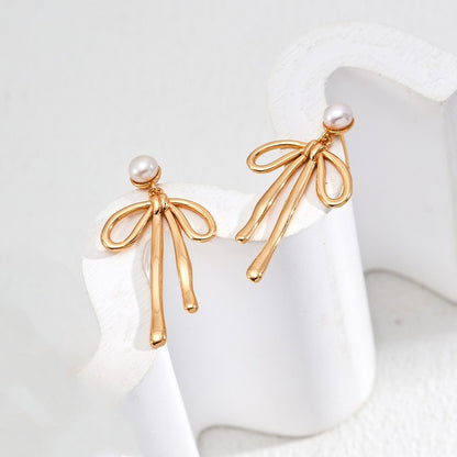 リボンデザイン ピアス(ゴールド・シルバー)